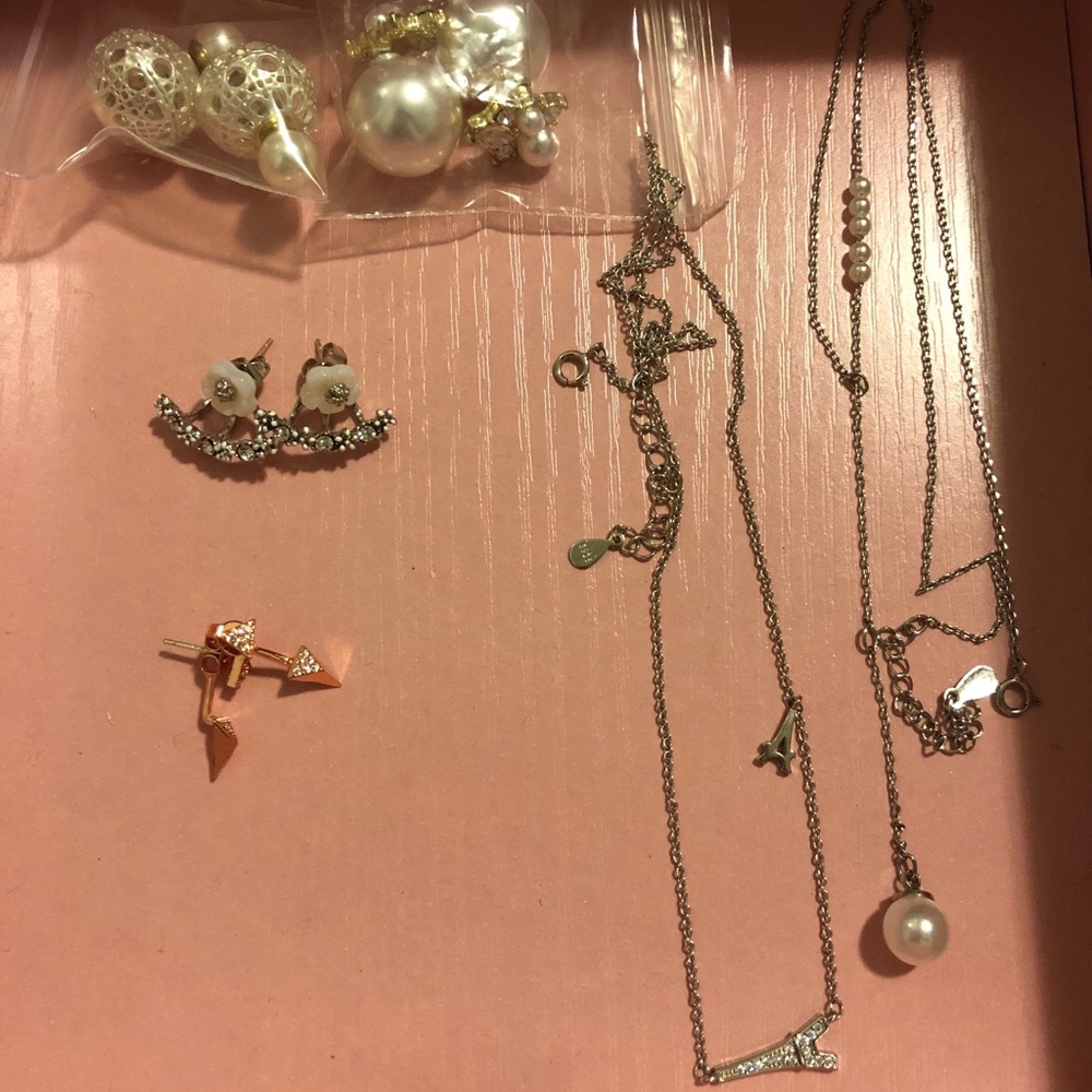 Four pair of earrings and two necklaces